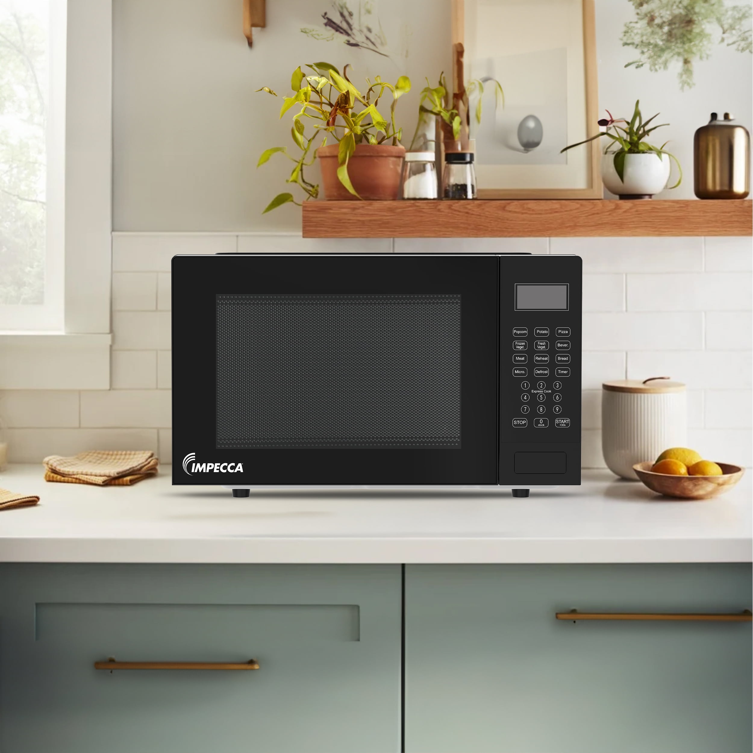 Impecca 0.9 cu ft Countertop Microwave Oven in Classic Black - Image 4