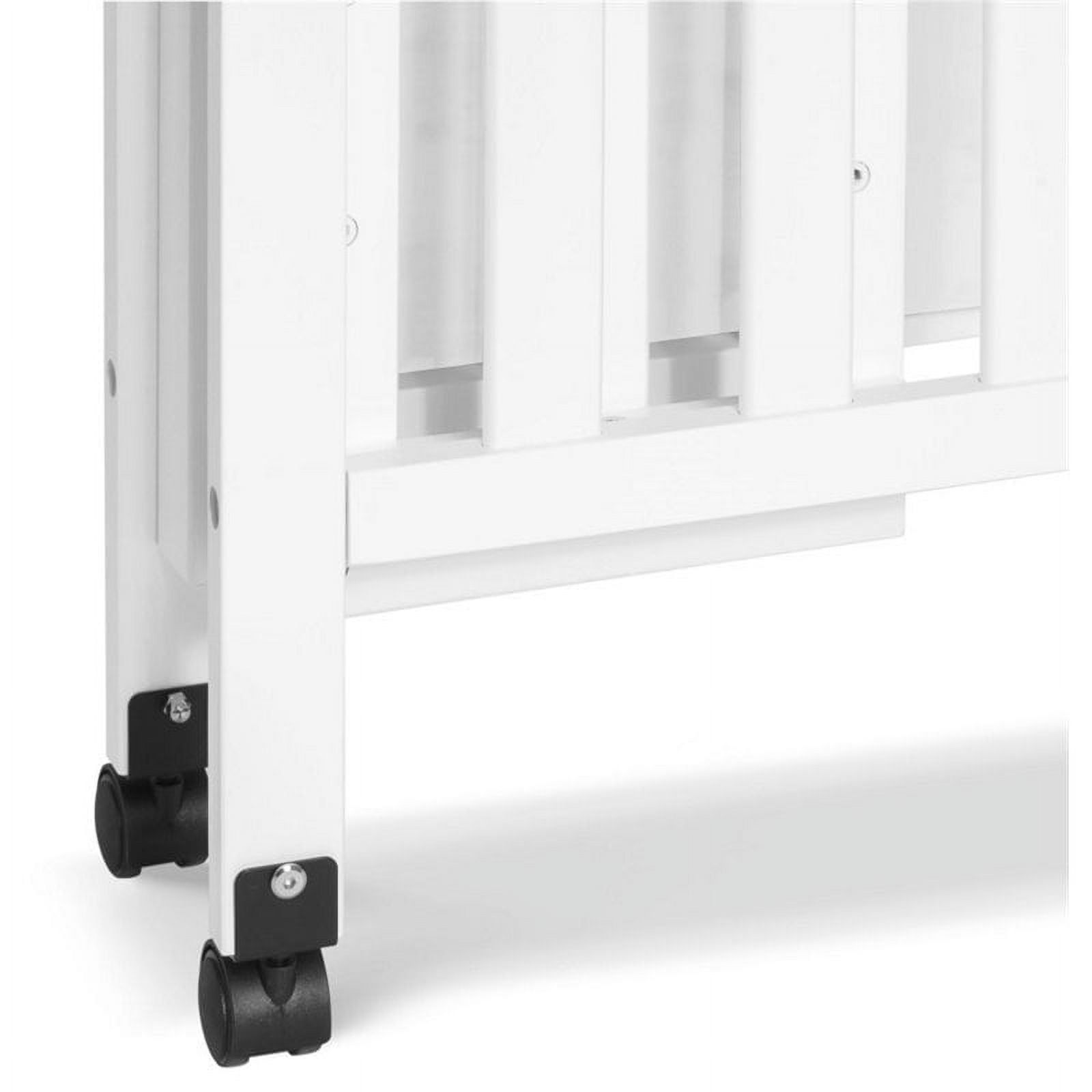 DaVinci Dylan Folding Portable 3-in-1 Mini Crib and Twin Bed in White - Image 4