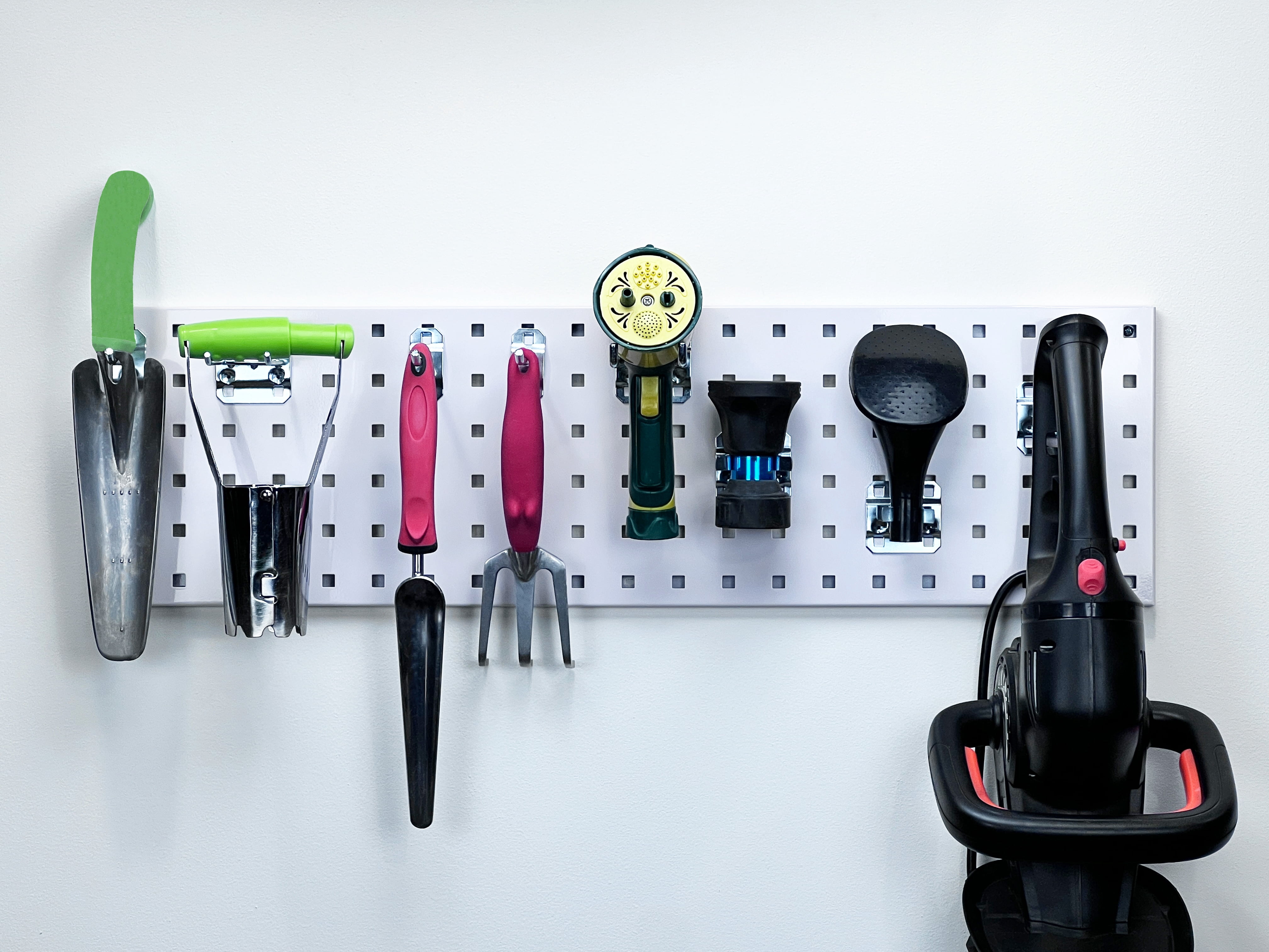 Triton Products® White Garden Storage Kit with (1) 31.5 In. x 9 In. 18 Gauge Steel Square Hole Pegboard and 8 pc LocHook Assortment - Image 3