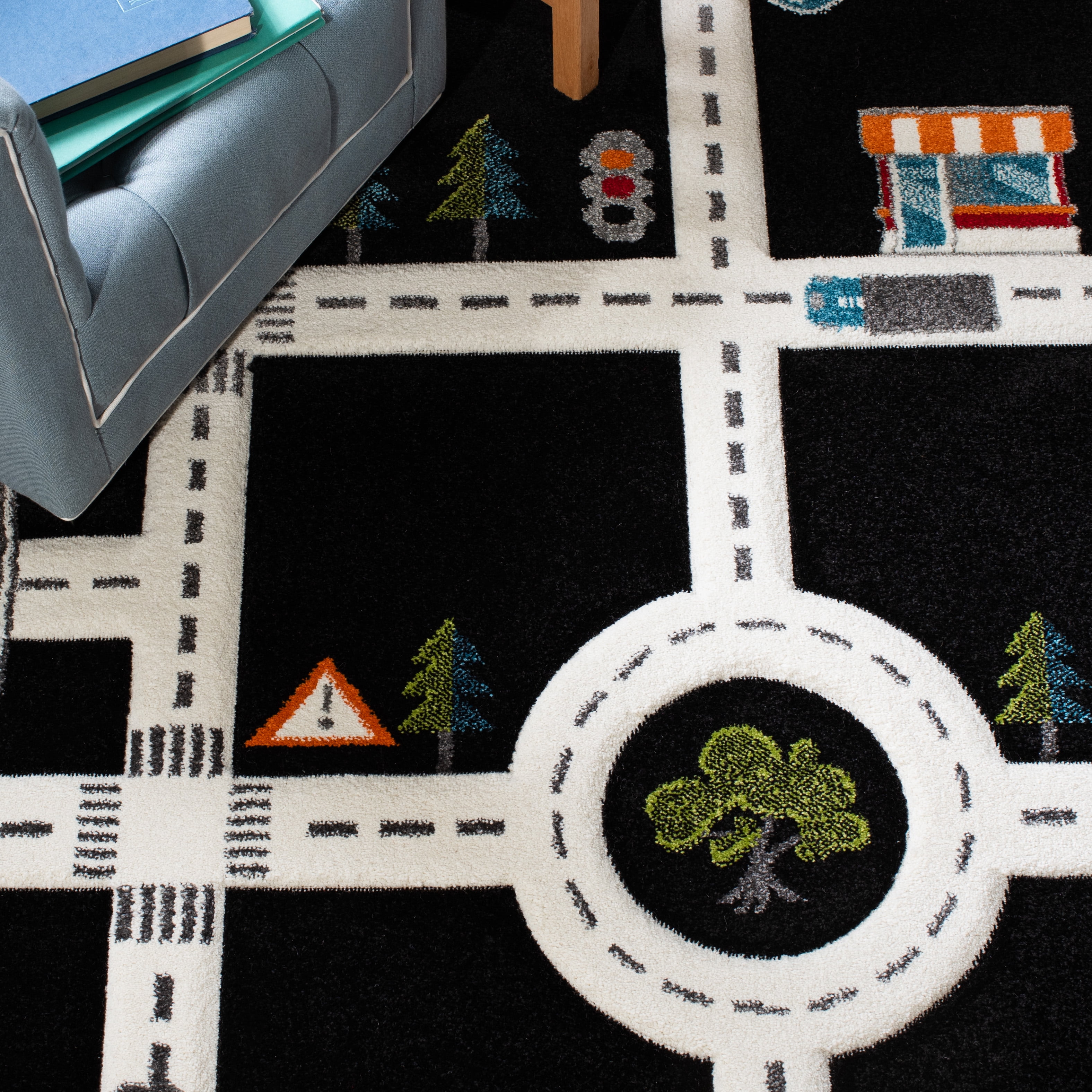SAFAVIEH Carousel Kids Devan Train Track Area Rug, Black/Ivory, 5'3" x 7'6" - Image 3