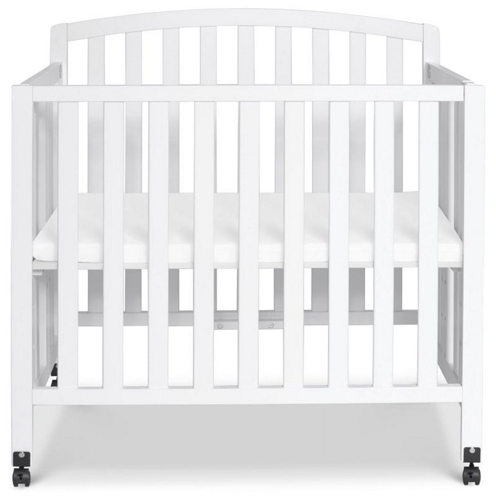 DaVinci Dylan Folding Portable 3-in-1 Mini Crib and Twin Bed in White - Image 7