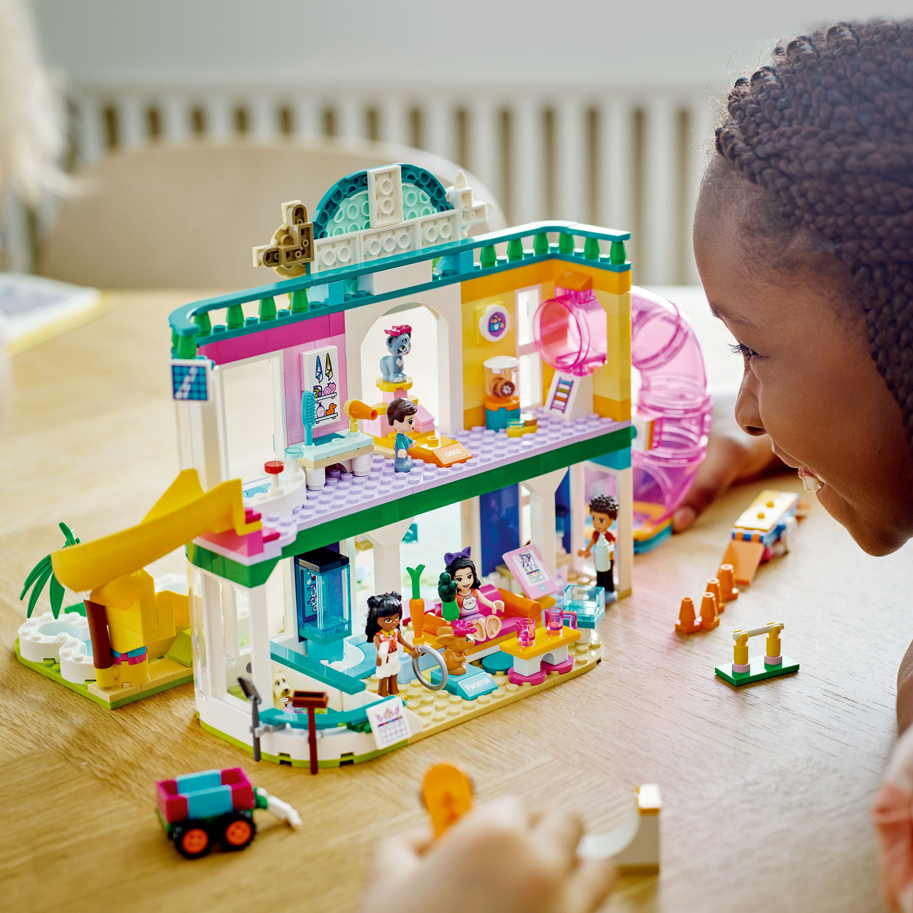 LEGO Friends Pet Day-Care Center 41718 Animal Set, Heartlake City Toy, Birthday Gifts for Kids, Girls and Boys 7 Plus Years Old, with Doggy Figure & 3 Mini Dolls - Image 5