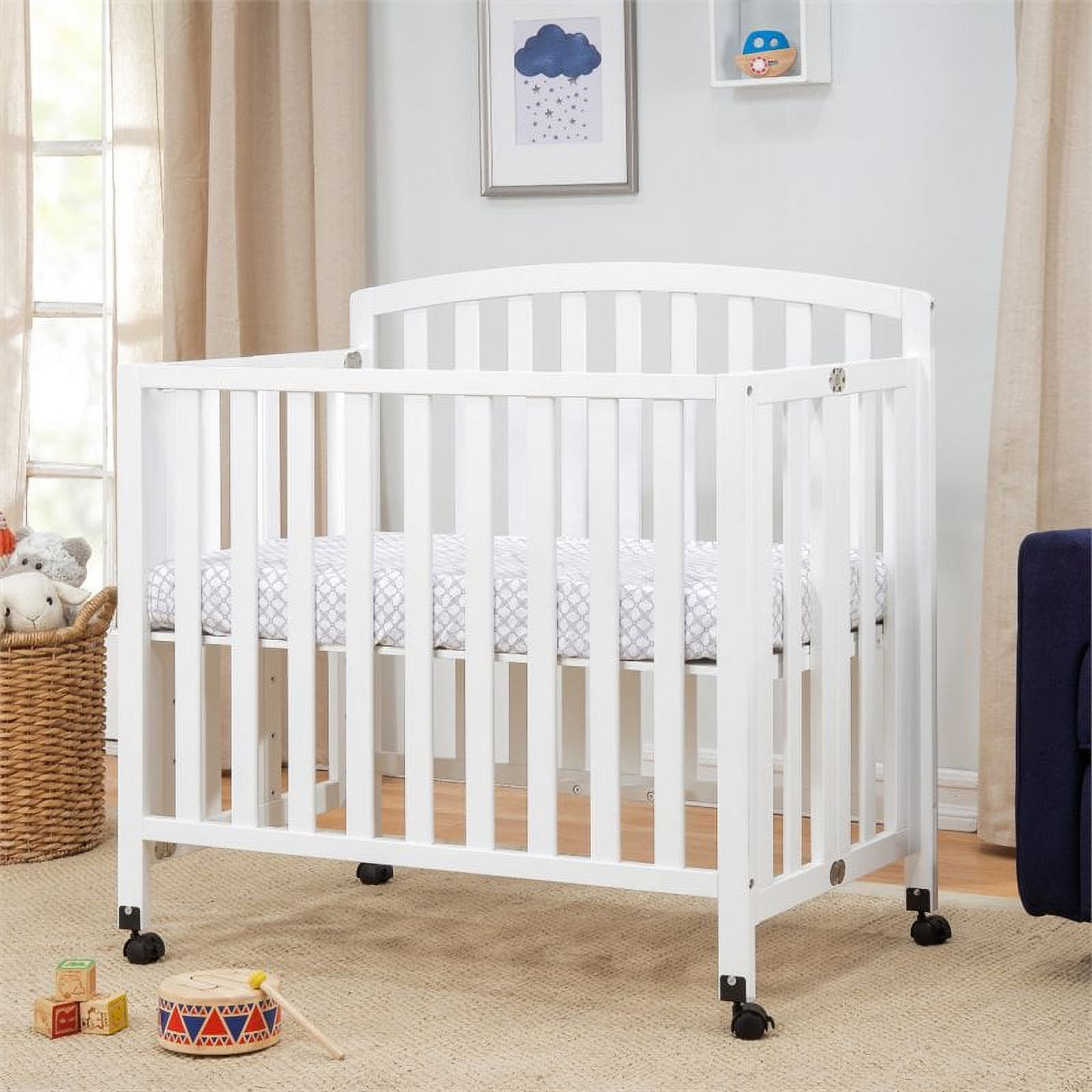 DaVinci Dylan Folding Portable 3-in-1 Mini Crib and Twin Bed in White - Image 3