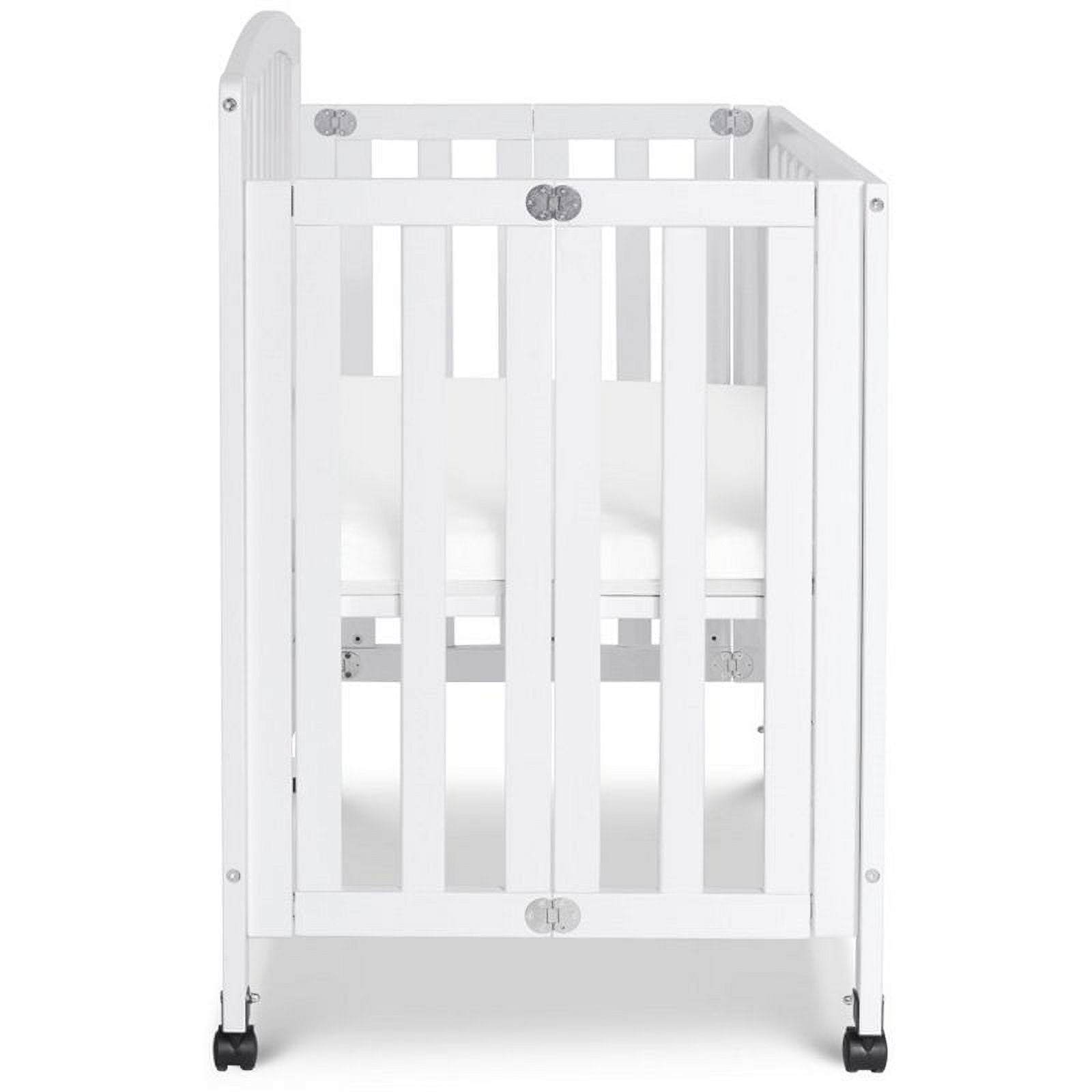 DaVinci Dylan Folding Portable 3-in-1 Mini Crib and Twin Bed in White - Image 2