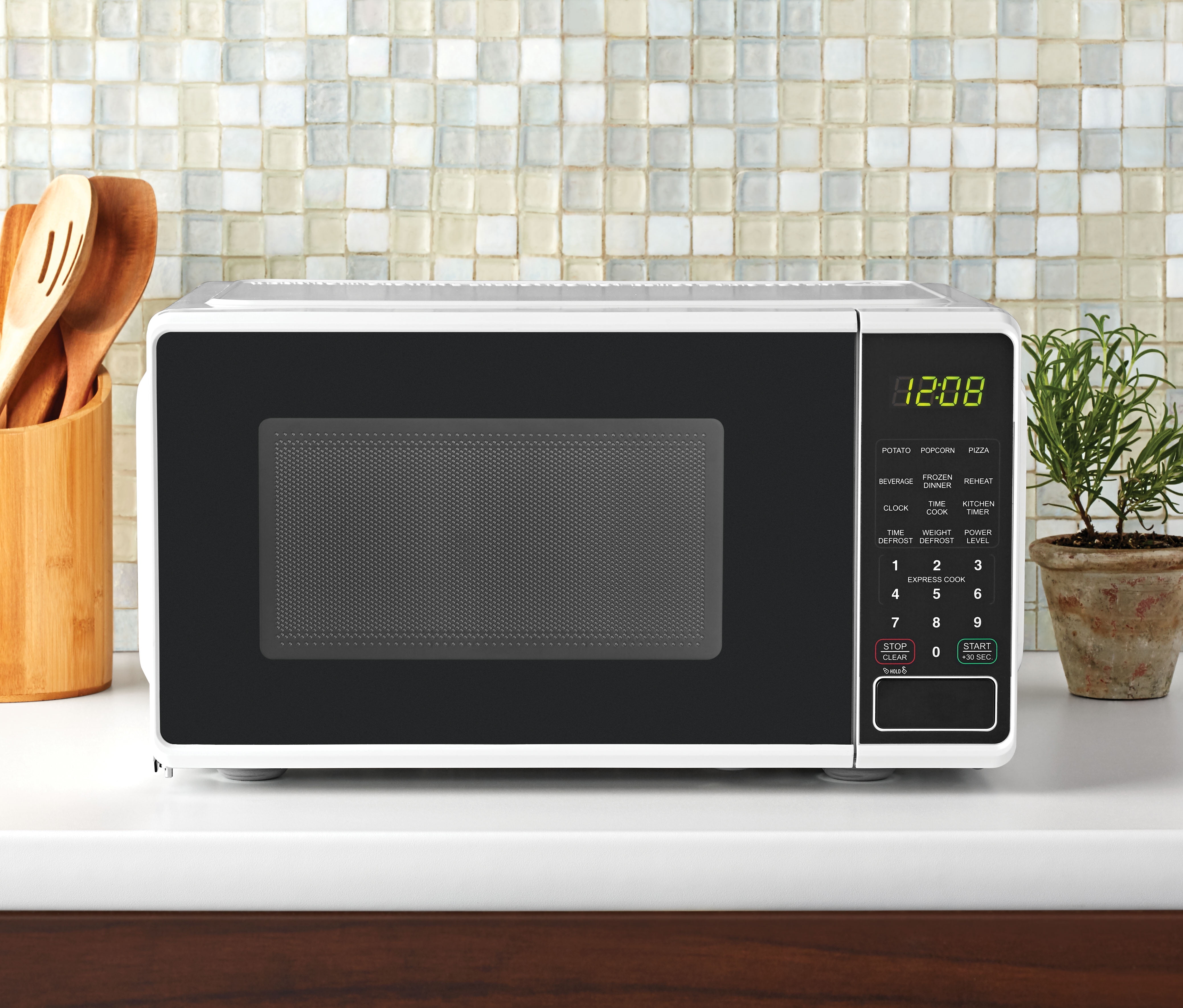 Mainstays 0.7 Cu ft Countertop Microwave Oven, 700 Watts, White - Image 7