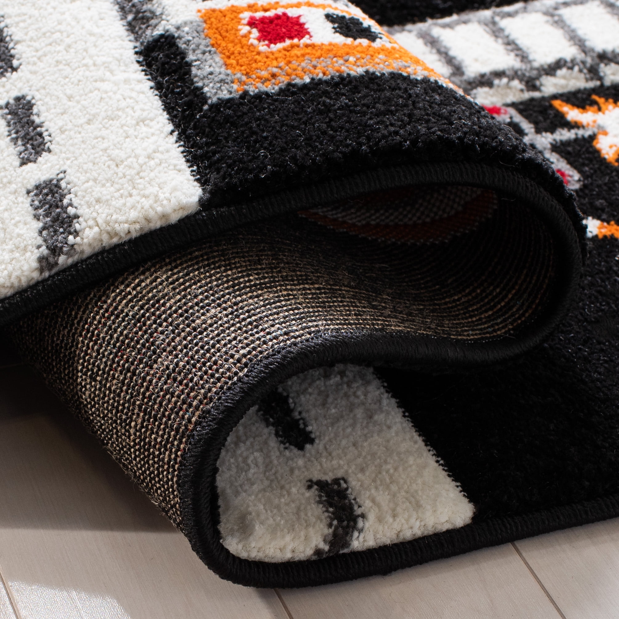 SAFAVIEH Carousel Kids Devan Train Track Area Rug, Black/Ivory, 5'3" x 7'6" - Image 4