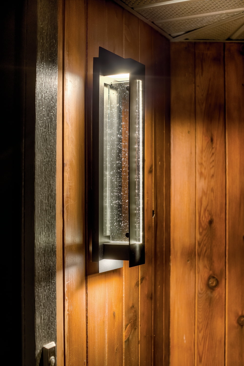 Kichler River Path 23" 1 Light Textured Black Integrated LED Outdoor Wall Sconce with Seeded Glass - Image 3