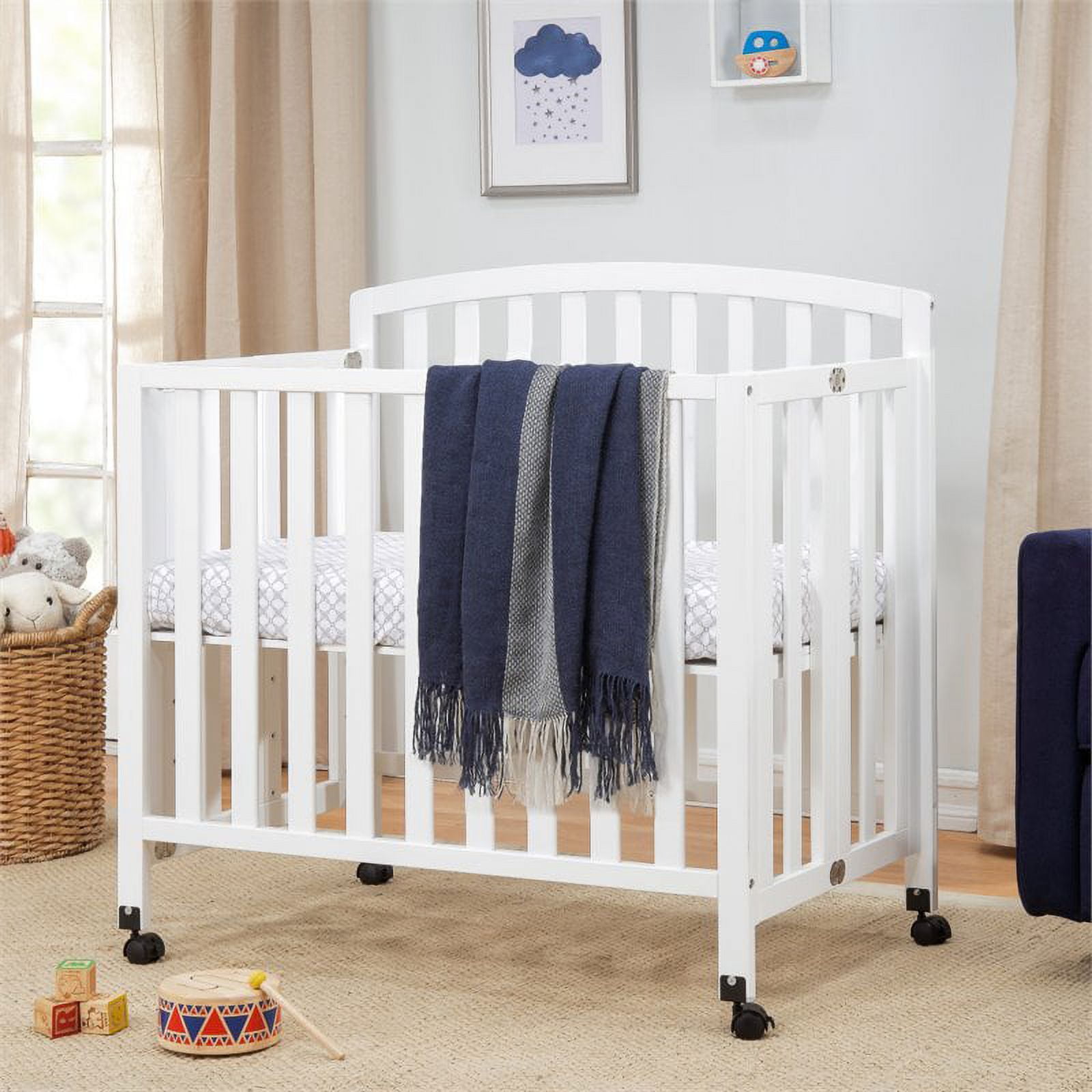 DaVinci Dylan Folding Portable 3-in-1 Mini Crib and Twin Bed in White - Image 5