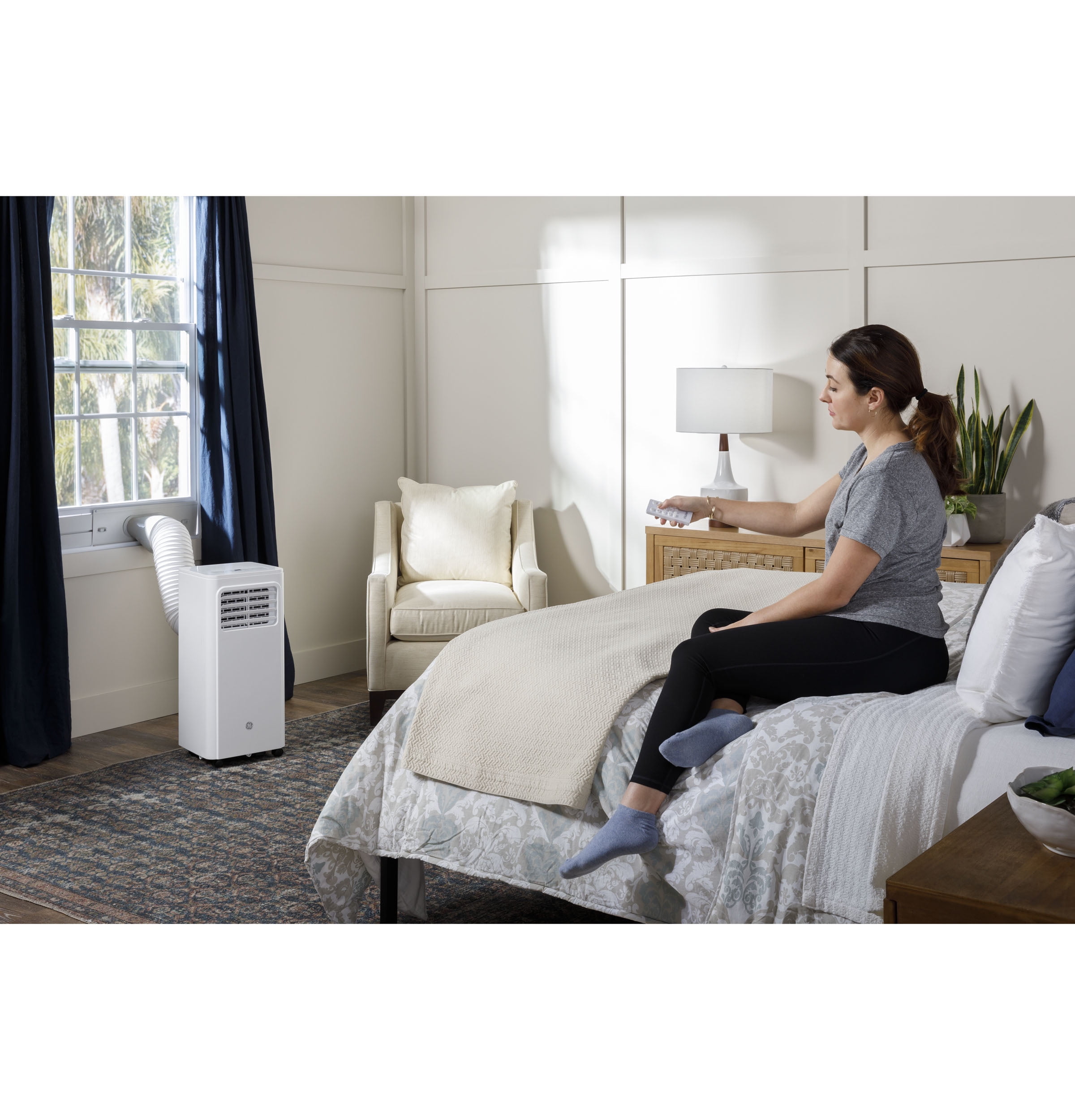 GE 6,100 BTU (9,000 BTU Ashrae) Portable Air Conditioner with Dehumidifier and Remote, White - Image 7