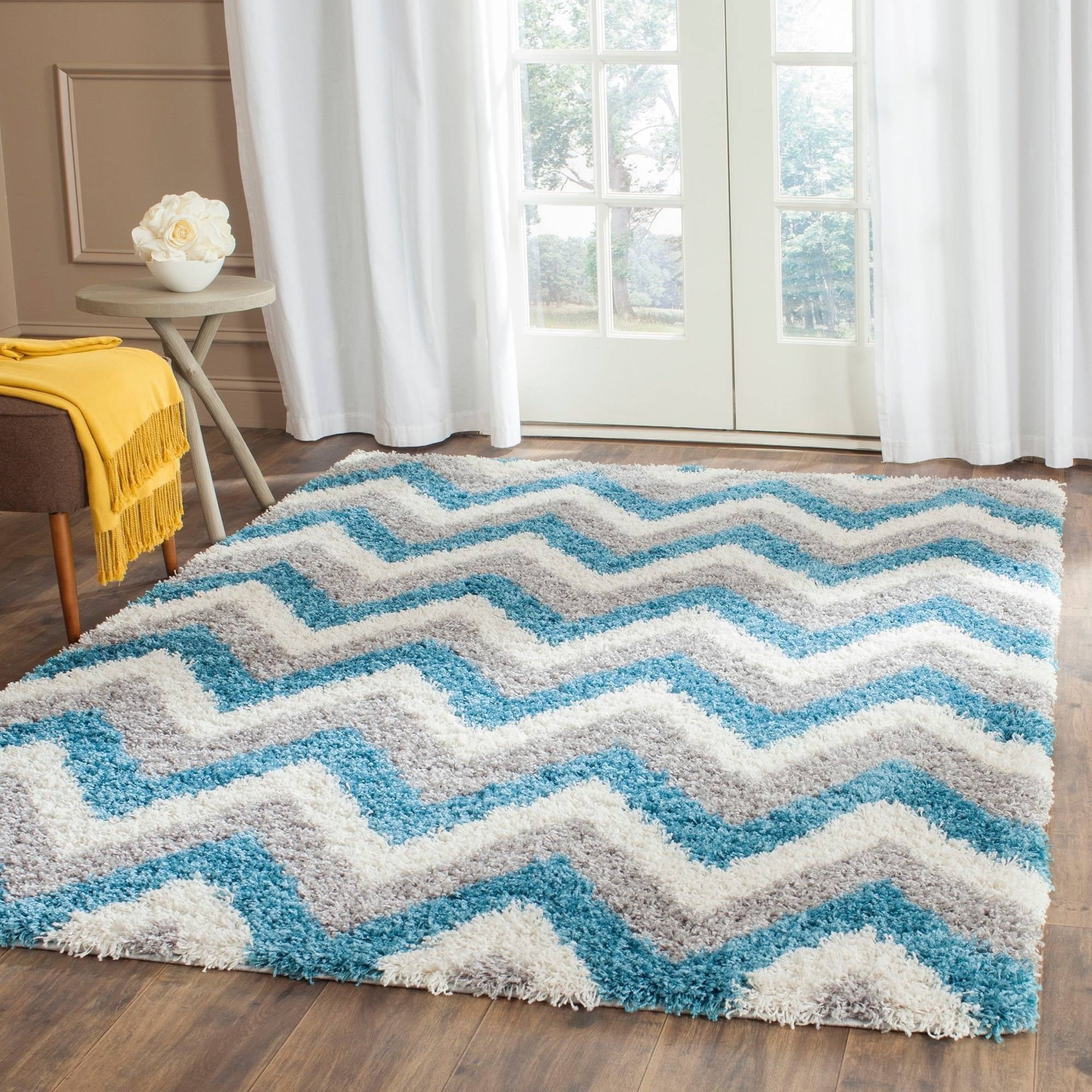 SAFAVIEH Willis Zigzag Stripes Kids Shag Area Rug, Ivory/Blue, 8' x 10'