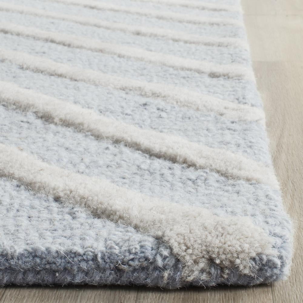 SAFAVIEH Cambridge Lilly Diamond Striped Wool Area Rug, Light Blue/Ivory, 6' x 9'