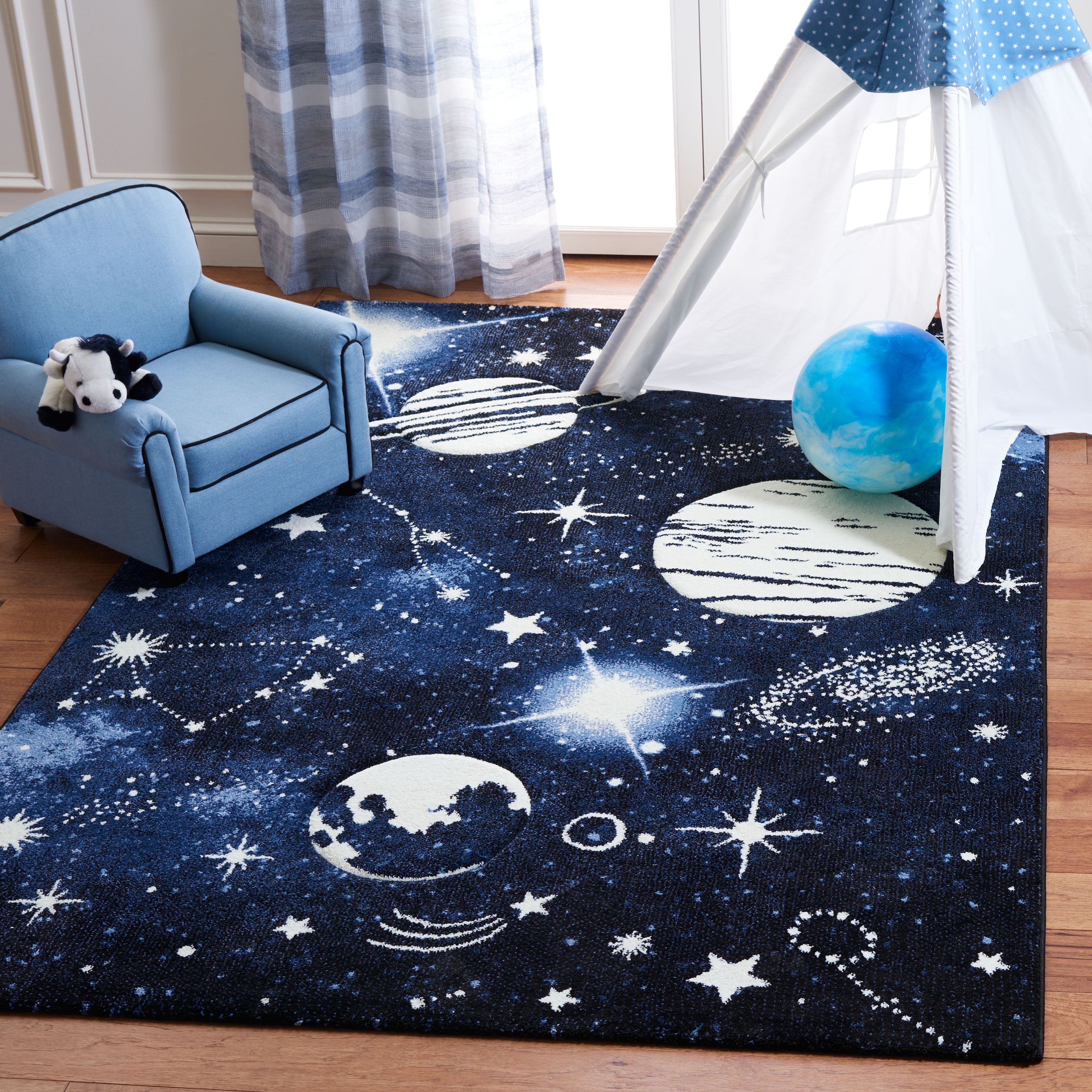 SAFAVIEH Carousel Kids Planets and Stars Area Rug, Dark Blue/Light Blue, 5'3" x 7'6"