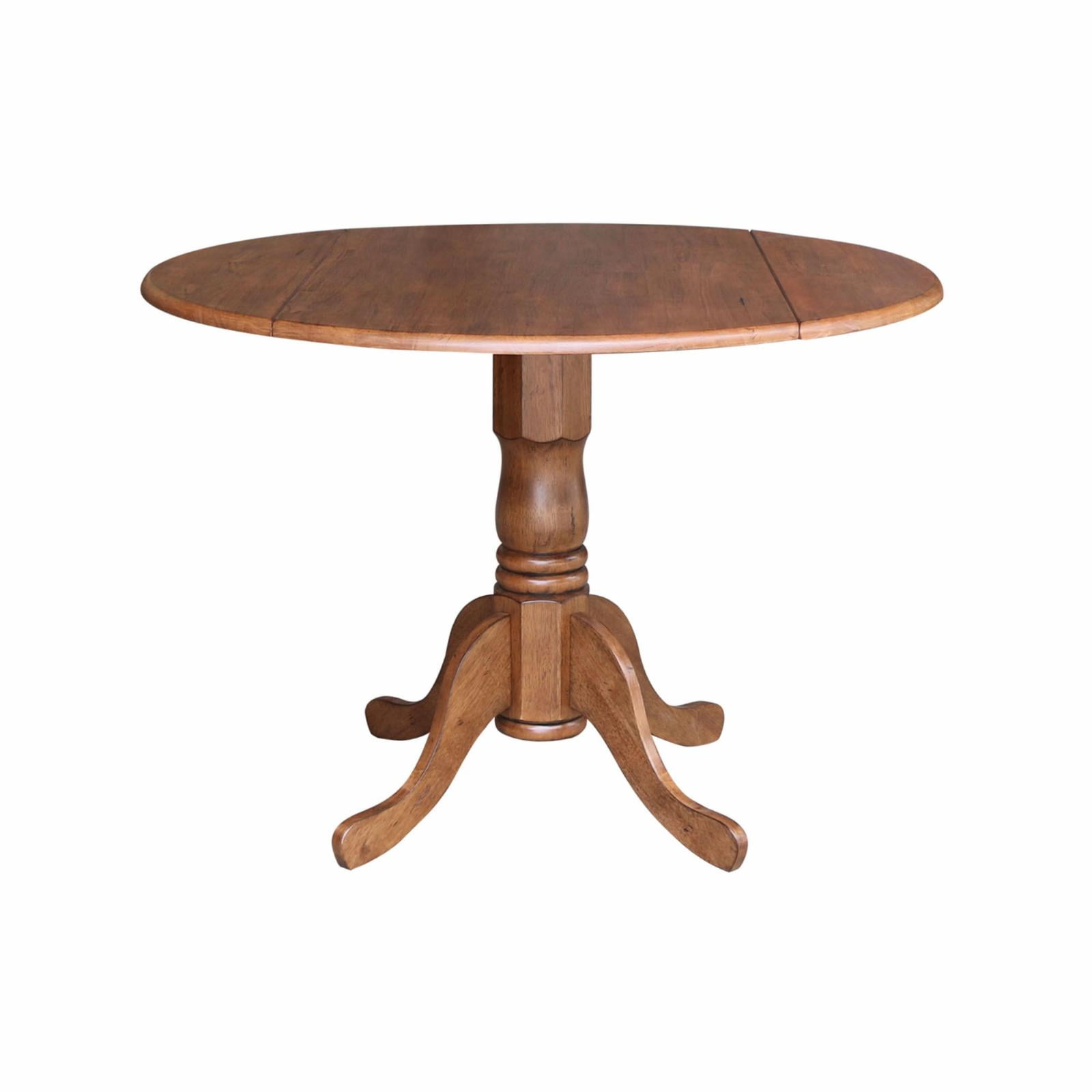42" Round Solid Wood Dual Drop Leaf Pedestal Table in Oak Finish
